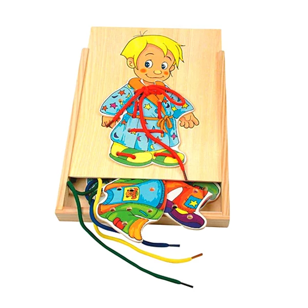 Fiús öltöztető fűzős fajáték